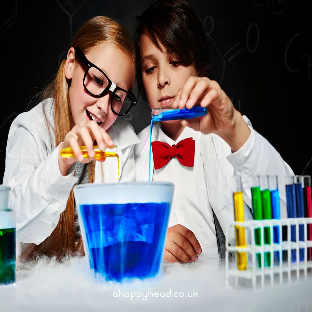 This is an image of two children dressed as scientists carrying out an experiment. They are having fun, not worrying.